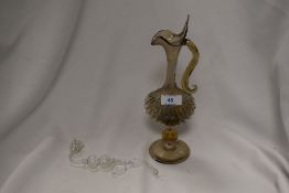A Venetian Murano glass ewer, amber glass with trailed blue glass decoration, most likely by