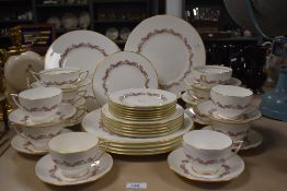 A quantity of Minton Laurentian pink china tableware, number S659