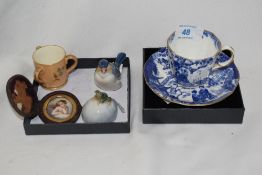 A Royal Crown Derby 'Mikado' cup and saucer, a Worcester Blush tig and a hand painted porcelain