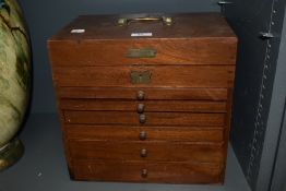 An early 20th century mahogany six draw draughtsman's/ engineers chest, having lid to top and