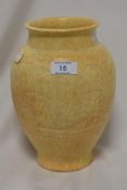A Royal Lancastrian pottery vase, of ovoid baluster form moulded with a band of repeating longboat