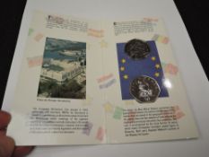 A Royal Mint Europe 1992-1993 Commemorative Fifty Pence Issue, Uncirculated, on folding card. OF all