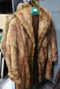 A vintage fur coat and jacket
