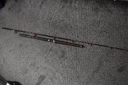 A DAM megalite uptide 9.5ft 6-8oz 2 pc rod in original soft sleeve