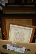 A carton of assorted pictures and prints.