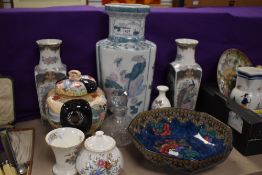 A large oriental style vase and a pair of similar vases, two small Wedgwood 'Kutani Crane' vases and