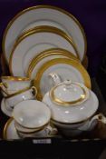 A part Bavaria Tirschenreuth tea service having gold banding and a similar part dinner service.