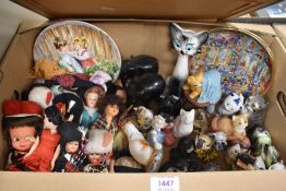 A collection of cat themed studies, two Wedgwood and two Franklin Mint collectors plates and a