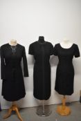 Three 1960s black wiggle dresses, including lace dress with bow detail to bust, medium to larger