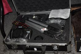 A Tamashi FMD camera with 50mm 1:6,3 lens and tripod flashgun in alloy case new and unused