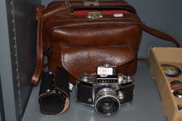 An Ihagee Exakta camera with Carl Zeiss Jena Pancolar 2/50 lens and Ihagee extention tube kit as