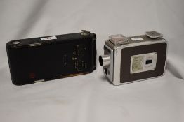 A Kodak Brownie 8mm movie camera and a Kodak No 1A Jr.