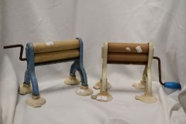 Two mid-20th Century Portair Limpet table top mangles in blue and cream, 20cm tall