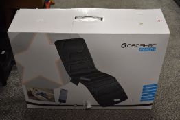A Neostar Health Heated Massage Mat, with box