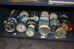 A group of twenty mid-20th Century enamelled and other alarm clarks, manufacturers including