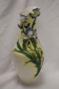 A 20th Century Graff porcelain vase with applied foliate detail, measuring 45cm tall