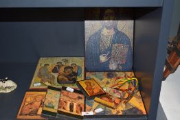 A collection of religious icon prints