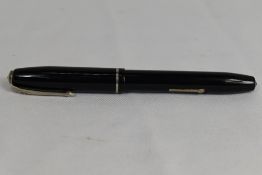 A Conway Stewart 75 lever fill fountain pen in black with single band to the cap having Conway