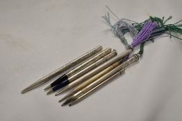 Seven small ladies Hallmarked or Sterling Silver propelling pencils