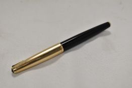A Parker 61 Custom converter double jewel fountain pen, with rolled gold cap having Parker 14k