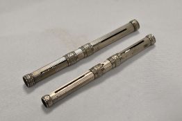 Two combination retractable pencil and dipping pens
