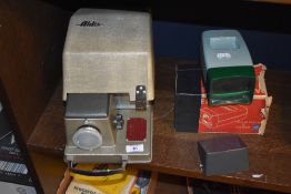 An Aldis 303 projector and a Paterson Majorview 35 viewer.