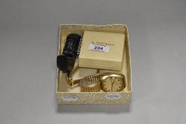A gentleman's Sekonda Automatic 27 Jewel wristwatch, with yellow metal expandable strap, another