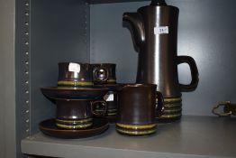 An attractive vintage ten piece studio pottery coffee set, in the manner or influenced by Denby