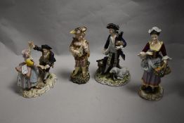 Four 20th century classically styled figurines, including one having crossed sword mark to