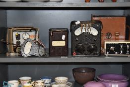 A collection of vintage testing equipment, including Universal Avomter and Maplin wave generator.