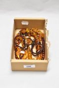 Three baltic amber/amber style necklaces.