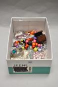 A variety of vintage and modern colourful costume jewellery, including beaded necklaces.