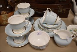 A Colclough Harlequin Ballet part tea service in pastel blue