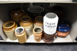 A group of stoneware storage jars, a Wetheriggs style lidded tureen, and other stoneware