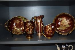Four pieces of Carlton ware Rouge Royale and a similar Wade jug.