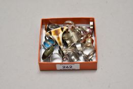 A small collection of costume jewellery rings, to include cabochon rings, and a polished horn