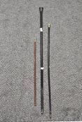 A 1920s ebonised walking cane with Birmingham silver knob, 91cm long, a Machine Gun Corps swagger