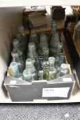 A box of vintage and antique glass advertising bottles, of Blackpool, Stockport, Ravensthorpe etc.