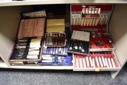A group of cased silver plated cutlery sets, to include coffee bean spoons, ivorine handled fish