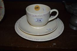 A Bridgwater pottery trio, having motto to edge.