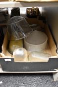 A selection of vintage glass light shades, including some ribbed glass shades.