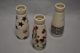 Three Emma Bridgwater miniature milk bottles.
