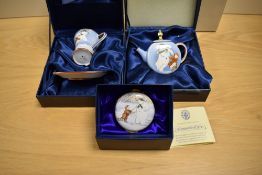 A collection of Border Fine Arts Snowman enamels and Three Royal Doulton Frosty Family studies.