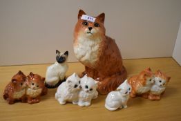 A group of Beswick pottery cat studies, to include; Persian 1867 (ginger) Siamese seated 1887,