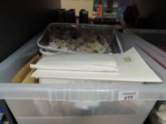 WORLD STAMP COLLECTION IN PACKETS, ENVELOPES ON AND OFF PAPER - MASSES TO GO THROUGH Plastic tub