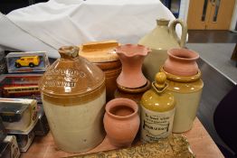 Two early 20th century flagons, including one marked for Geore Bird wine merchant, Penrith, a
