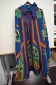 A vintage woolen long sleeved cardigan decorated with geometric patterns