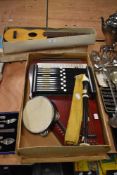 A mid century ukulele in box, a recorder, a small tambourine and a vintage auto harp.