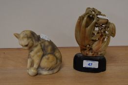 A Chinese soapstone carving of a floral arrangement, 16cm tall, together with a marble cat