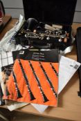 An Artley clarinet, cased with accesories etc